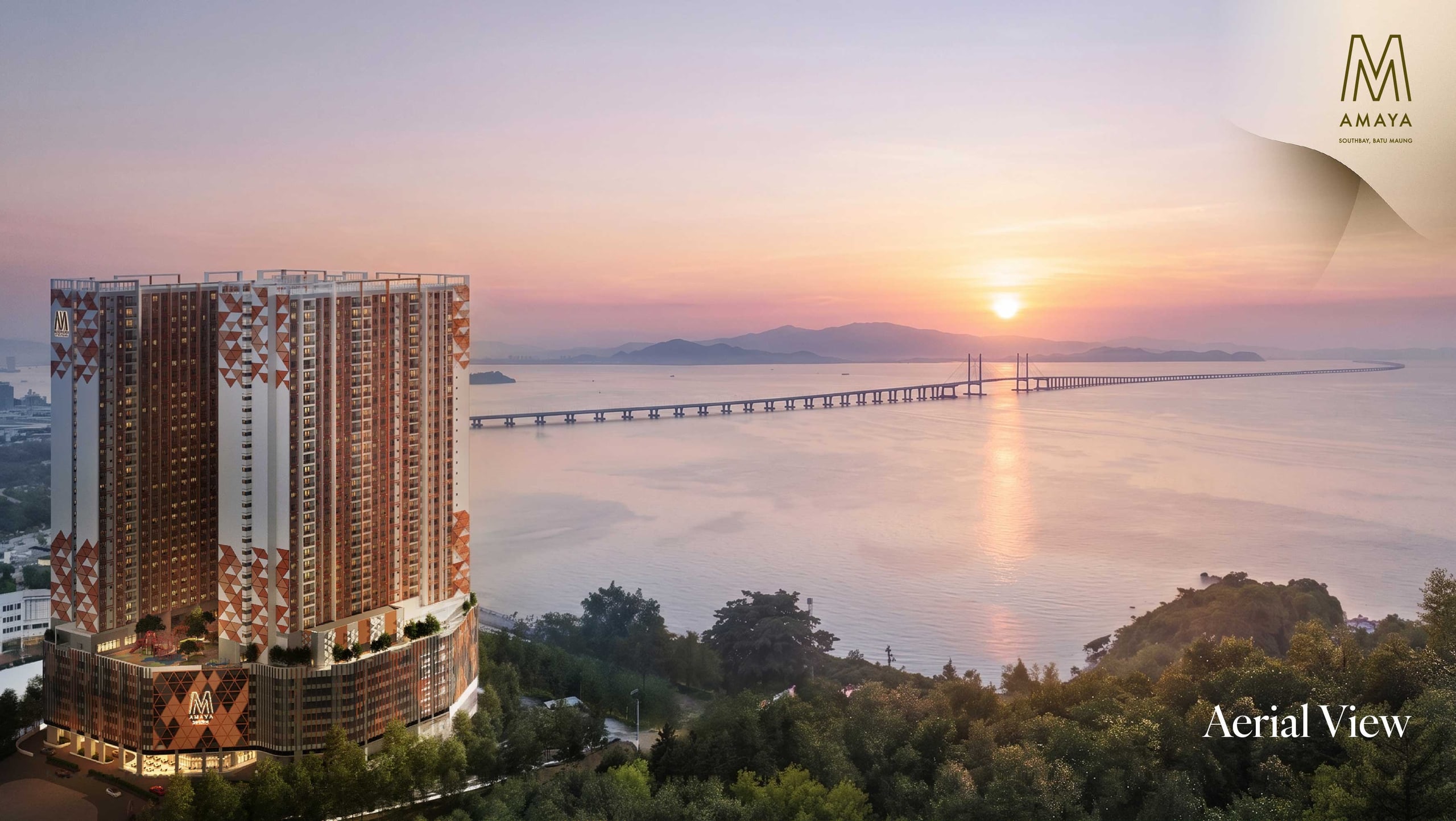 Aerial view of the two M Amaya towers rising above the Southbay coastline at Batu Maung