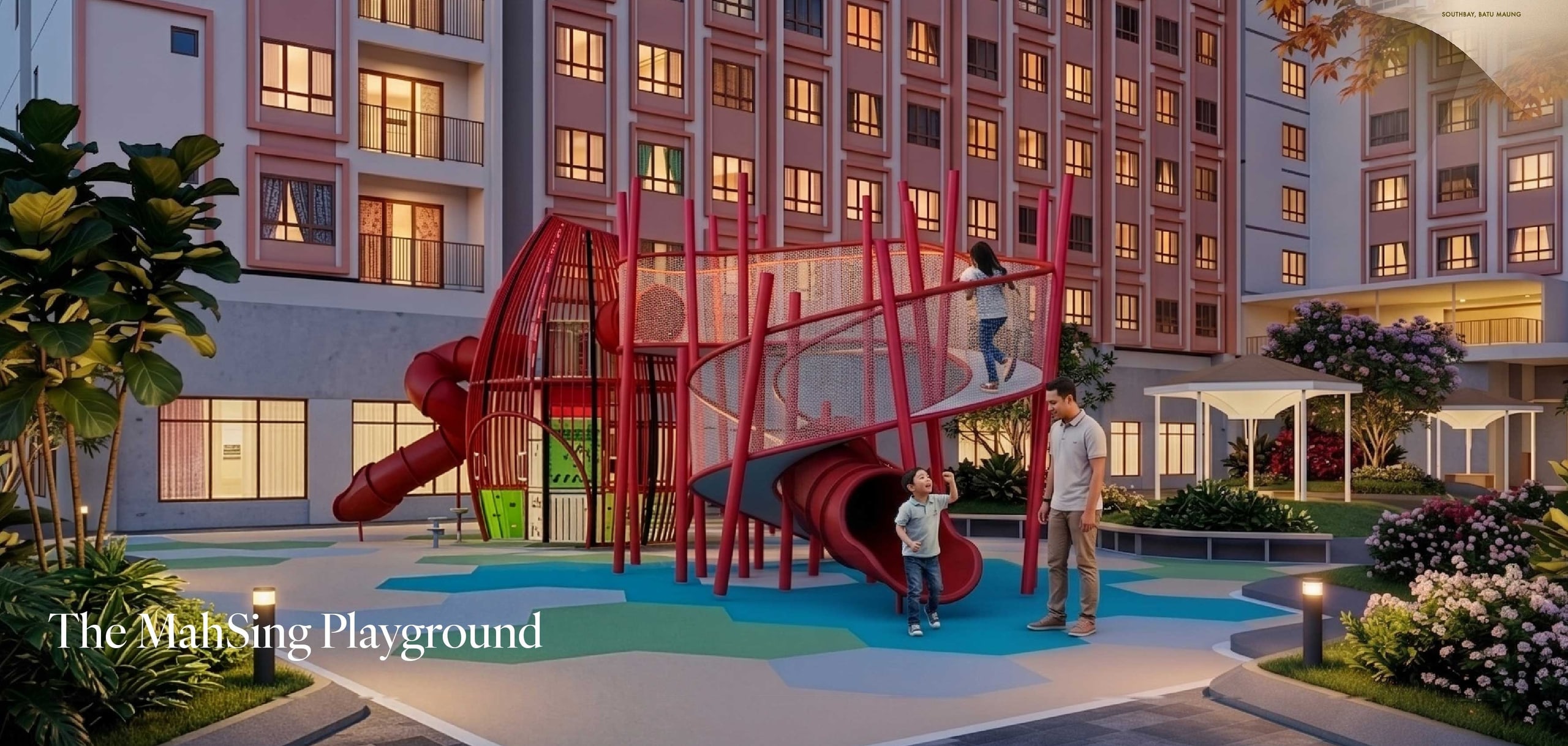 Sculptural red climbing playground with soft surfacing and parent seating alongside